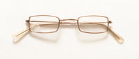 Rectangular metal eyeglasses with a thin gold frame and clear lenses, displayed on a clean white background.