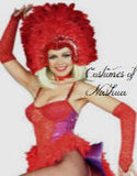 A woman modeling a vibrant red and purple costume with a large red feathered headdress and long red gloves against a plain white background. The text 'Costumes of Natasha' is overlaid on the image.