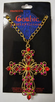 Franco's Gothic Jewelry Collection gold cross pendant necklace with red and pink rhinestones, displayed on its original black backing card.