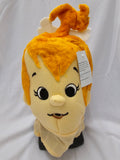 A plush character mask with a pale yellow face and neck, bright orange hair, and a white bone hair accessory, photographed against a white fabric backdrop. A product tag is attached to the side.