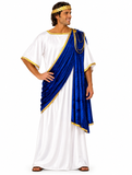 A man modeling a white toga costume with a royal blue draped sash trimmed in gold, a matching gold headband, and gold necklace accessories, set against a plain white background.
