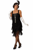 A woman modeling a 1920s flapper costume on a white studio background. The costume includes a black sequined fringed dress, long white gloves, a black feathered headband with a pearl necklace, and black fishnet stockings and heels.