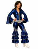A woman modeling a shiny royal blue Elvis-style costume with silver trim, a matching belt, and white high-heeled boots against a plain white background.