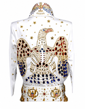 A white Elvis Presley-style jumpsuit or costume jacket shown from the back, heavily embellished with gold rhinestones forming an eagle design, with blue and red stones, gold stars, and patriotic emblems on the waistband.