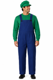 A men modeling blue overalls with long-sleeve green shirt and green hat against a plain white background.