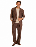 A man modeling a brown two-piece suit with a beige crewneck t-shirt and brown dress shoes, standing against a solid white background.