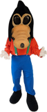 A full-body cartoon mascot costume featuring a black and tan bird-like head, an orange-red shirt, green suspenders, bright blue pants, and black shoes, isolated on a white background.